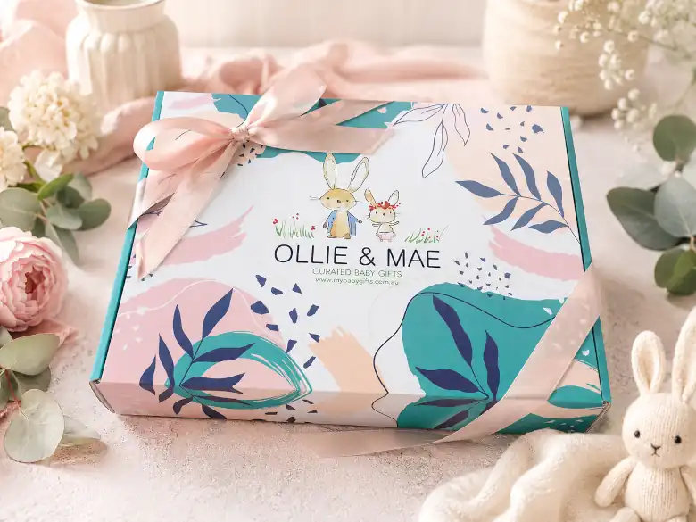 Curated baby gift hamper packed into a gift box